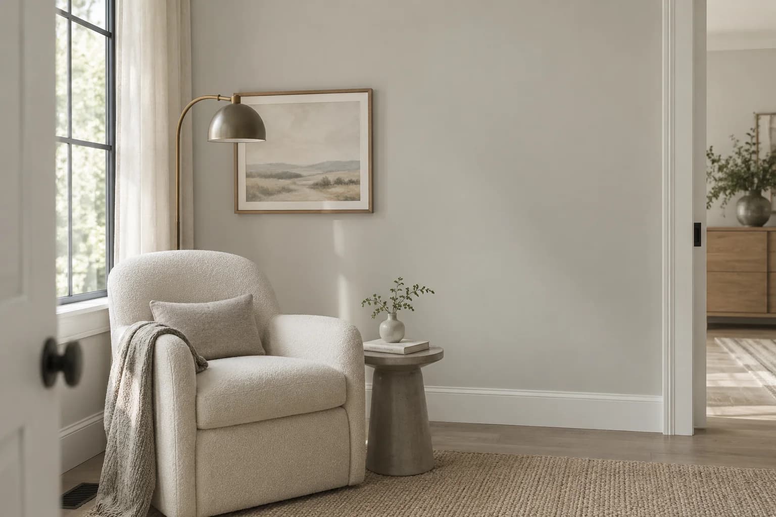 Reading nook with Dolphin Fin walls and a cream armchair