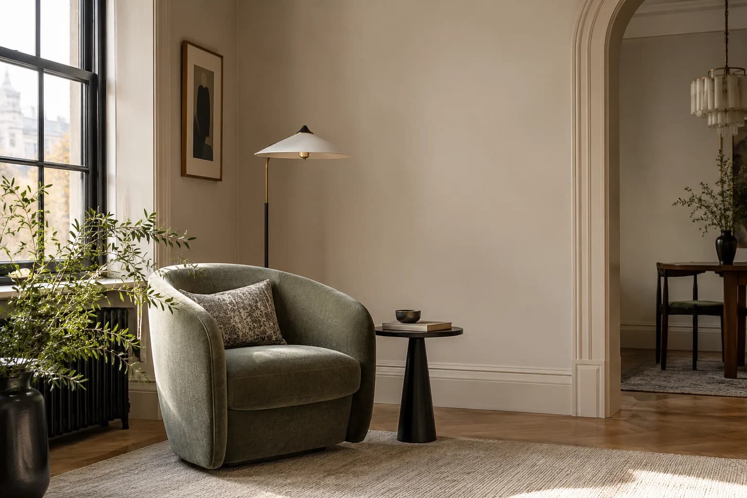 Reading nook with Sculptor Clay walls and a cream armchair