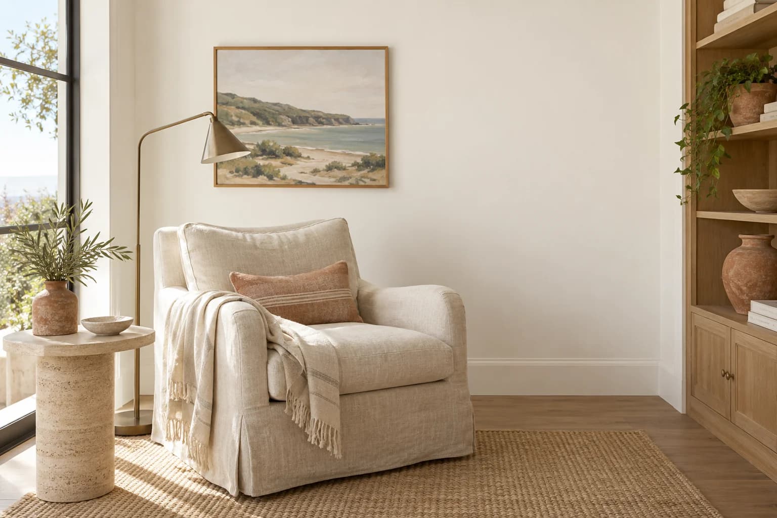 Reading nook with Antique Paper walls and a cream armchair