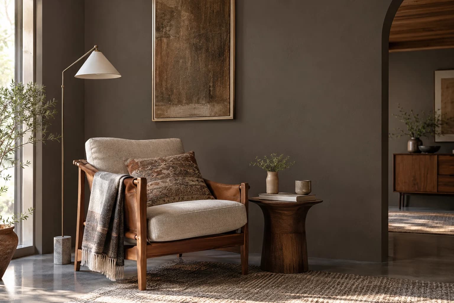 Reading nook with Weathered Brown walls and a cream armchair