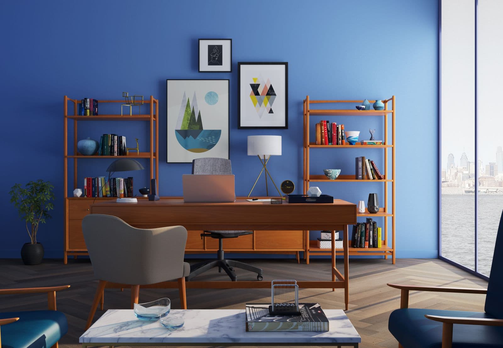 Home office with a bold blue accent wall and wood desk