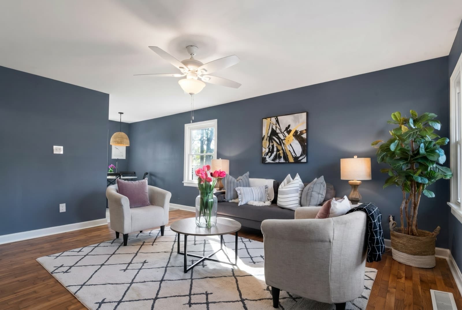 Living room repainted in Hale Navy by Benjamin Moore