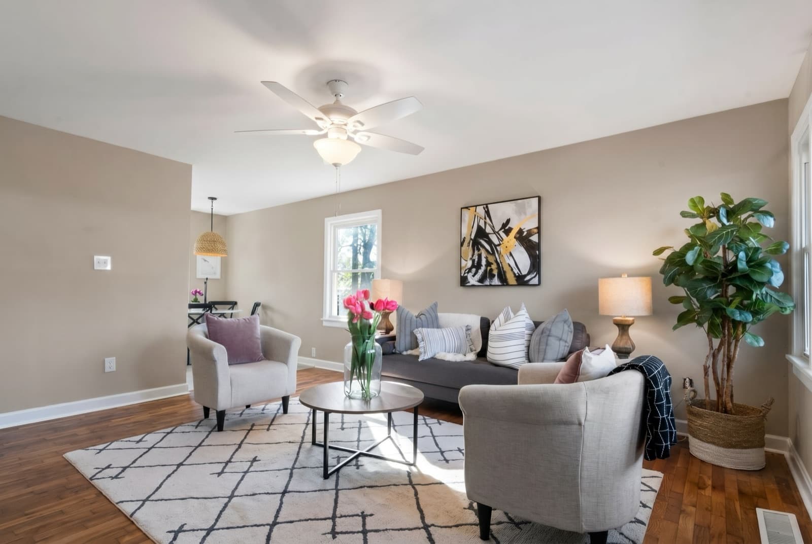Living room repainted in Perfect Taupe by Behr