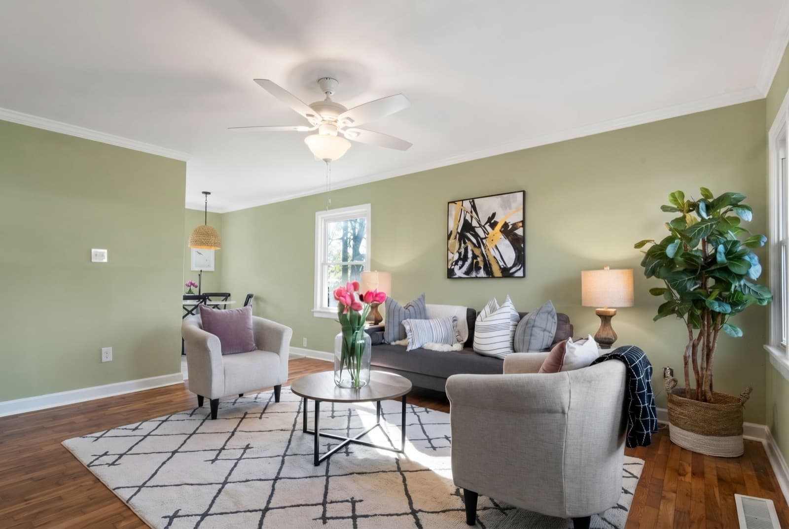 Living room repainted in Back To Nature by Behr