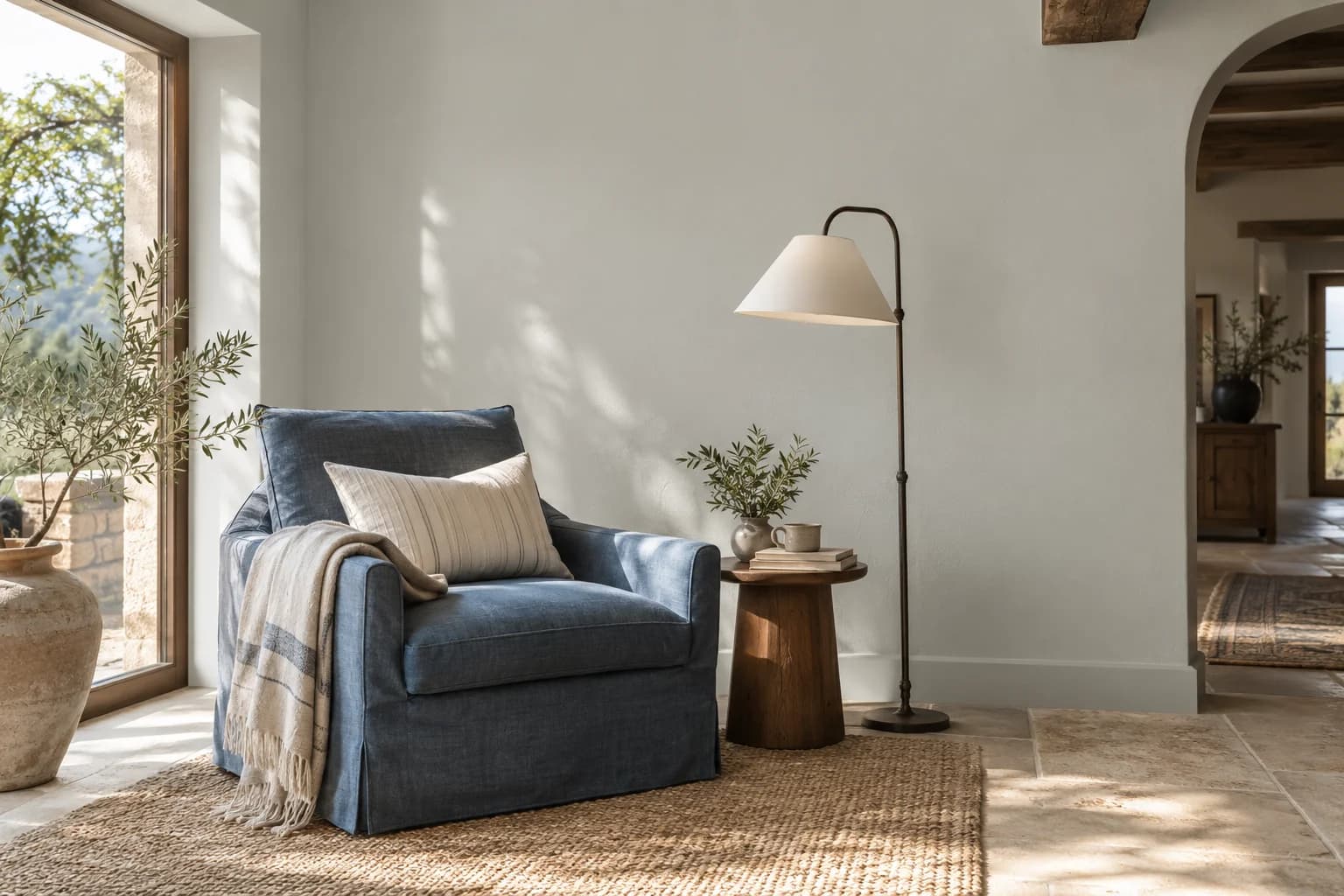 Reading nook with Silver City walls and a cream armchair