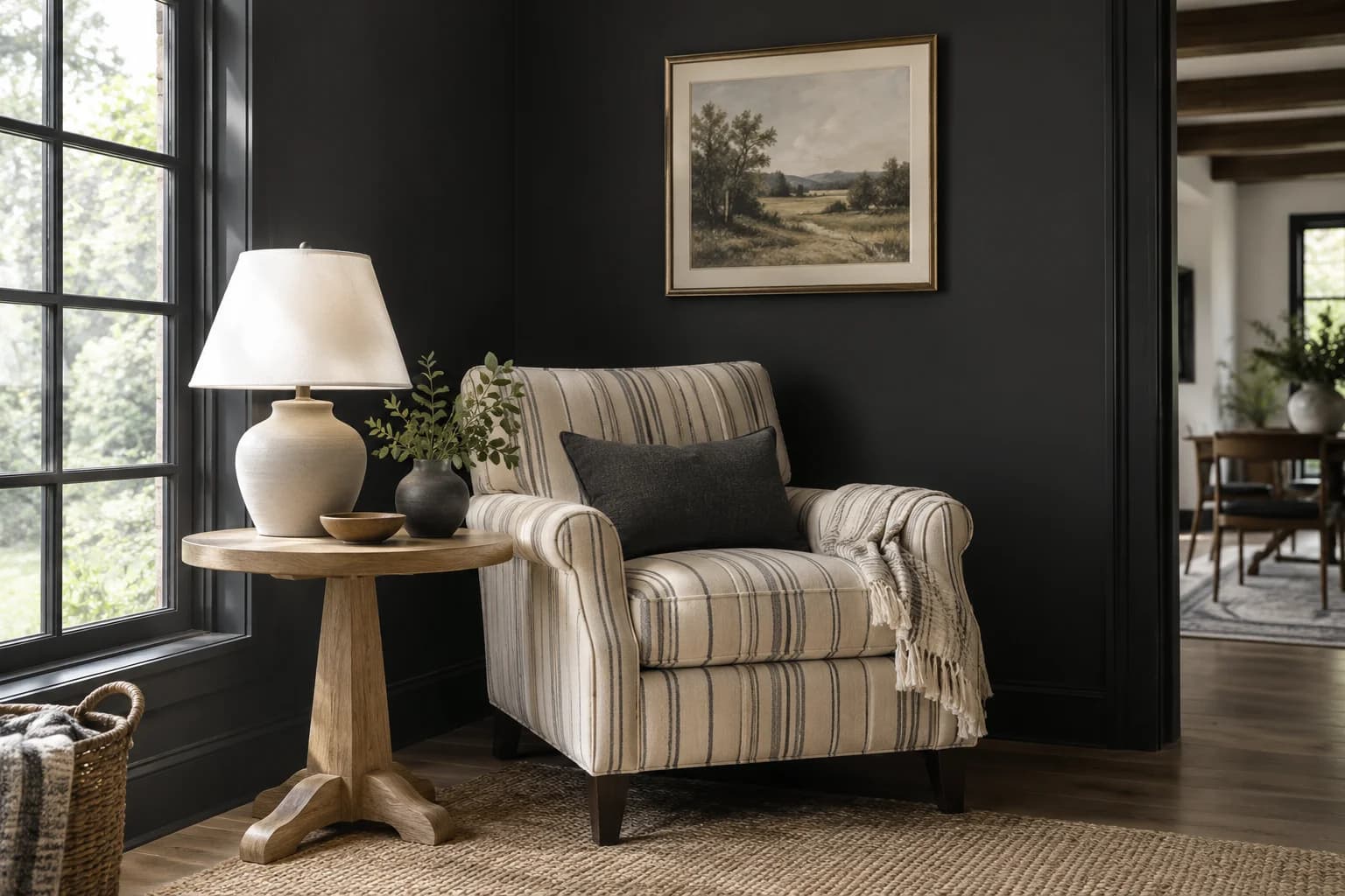 Reading nook with Onyx walls and a cream armchair