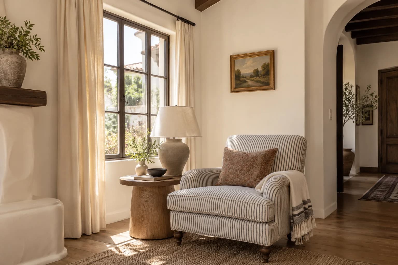 Reading nook with Dimity walls and a cream armchair
