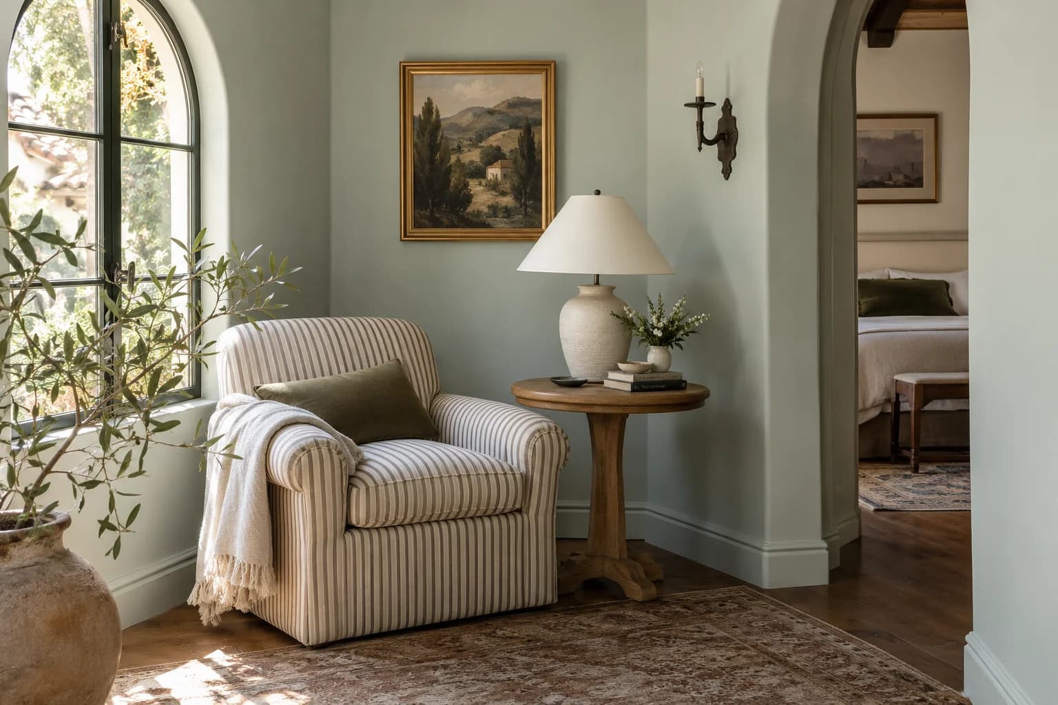 Reading nook with Rainwashed walls and a cream armchair