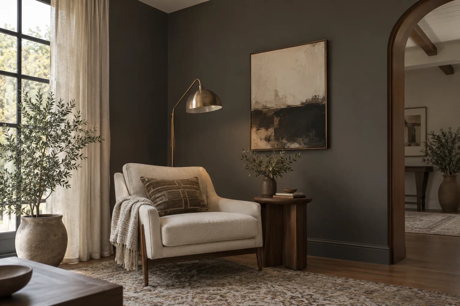 Reading nook with Urbane Bronze walls and a cream armchair