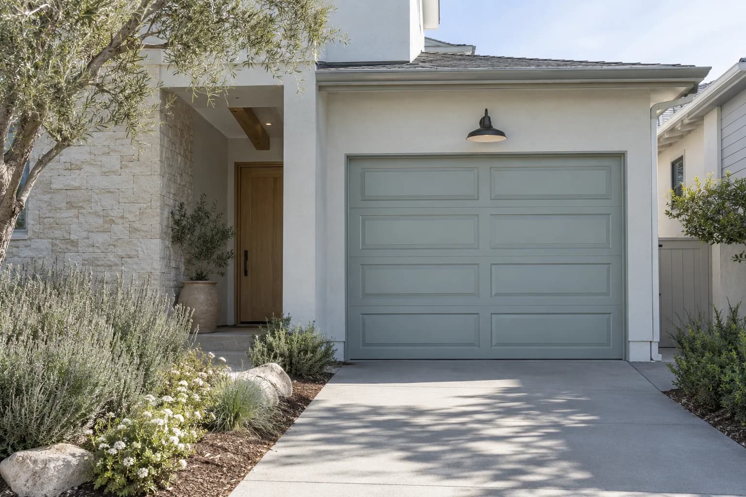 Garage door featuring Blue Arrow paint