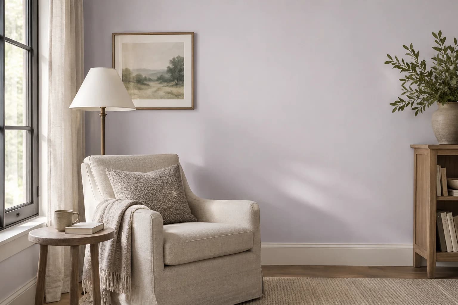 Reading nook with Gentle Violet walls and a cream armchair