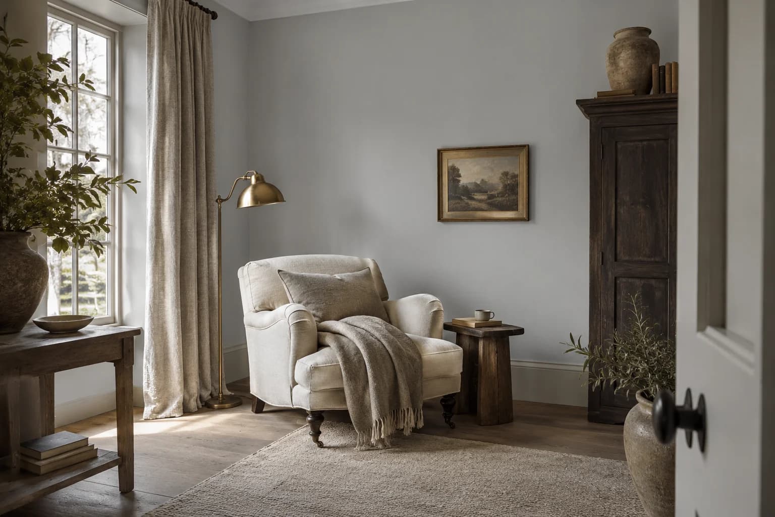 Reading nook with Gravity walls and a cream armchair